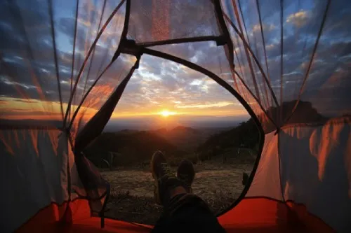Camping scene at sunrise