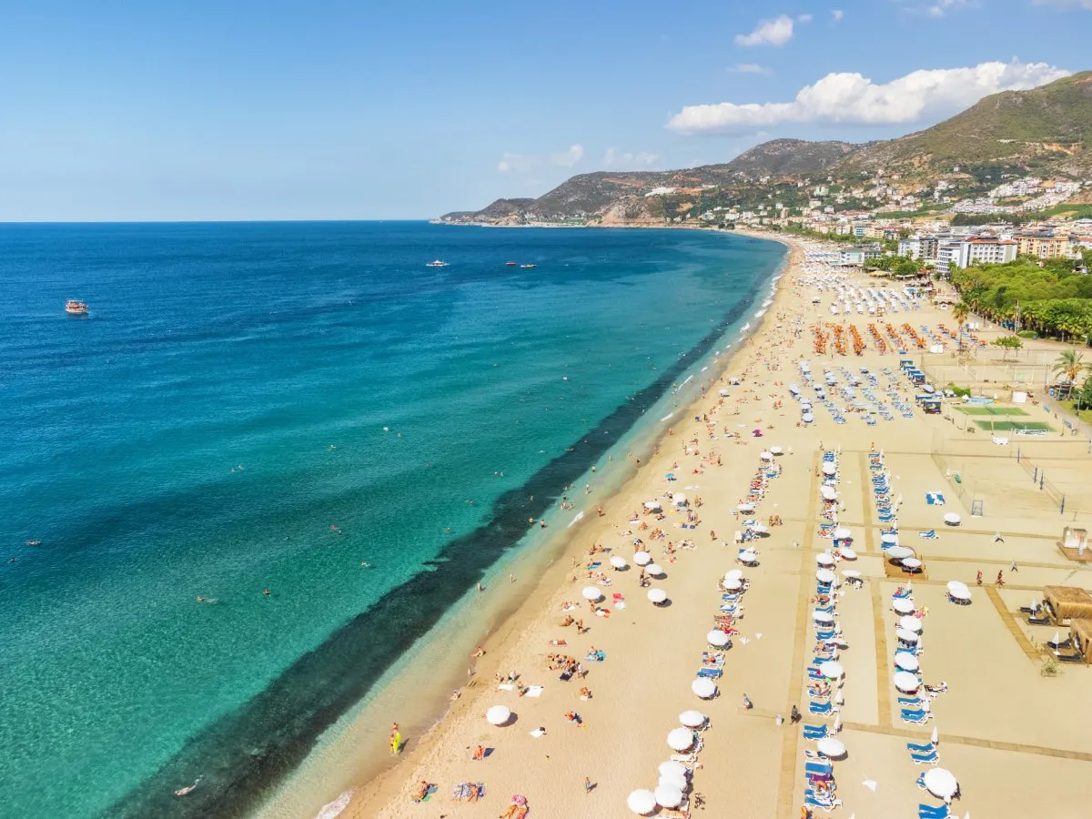 coastal beach with lots of sunbeds