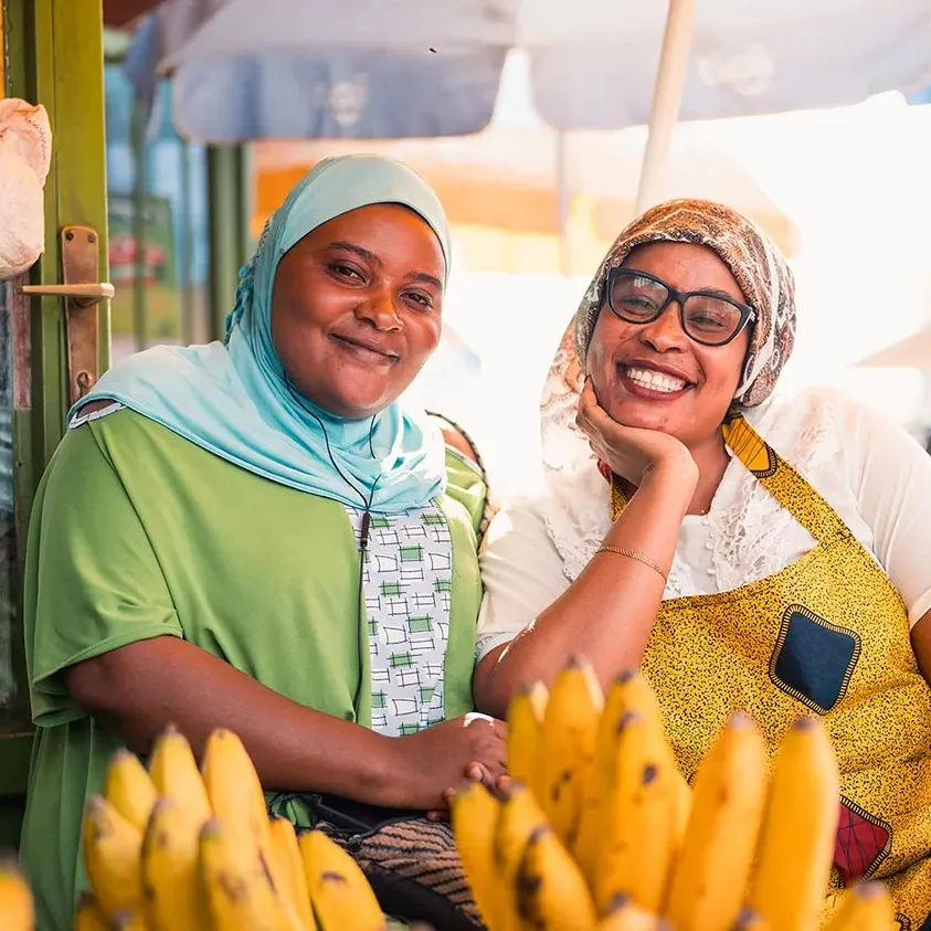 Happy Ladies at a Market