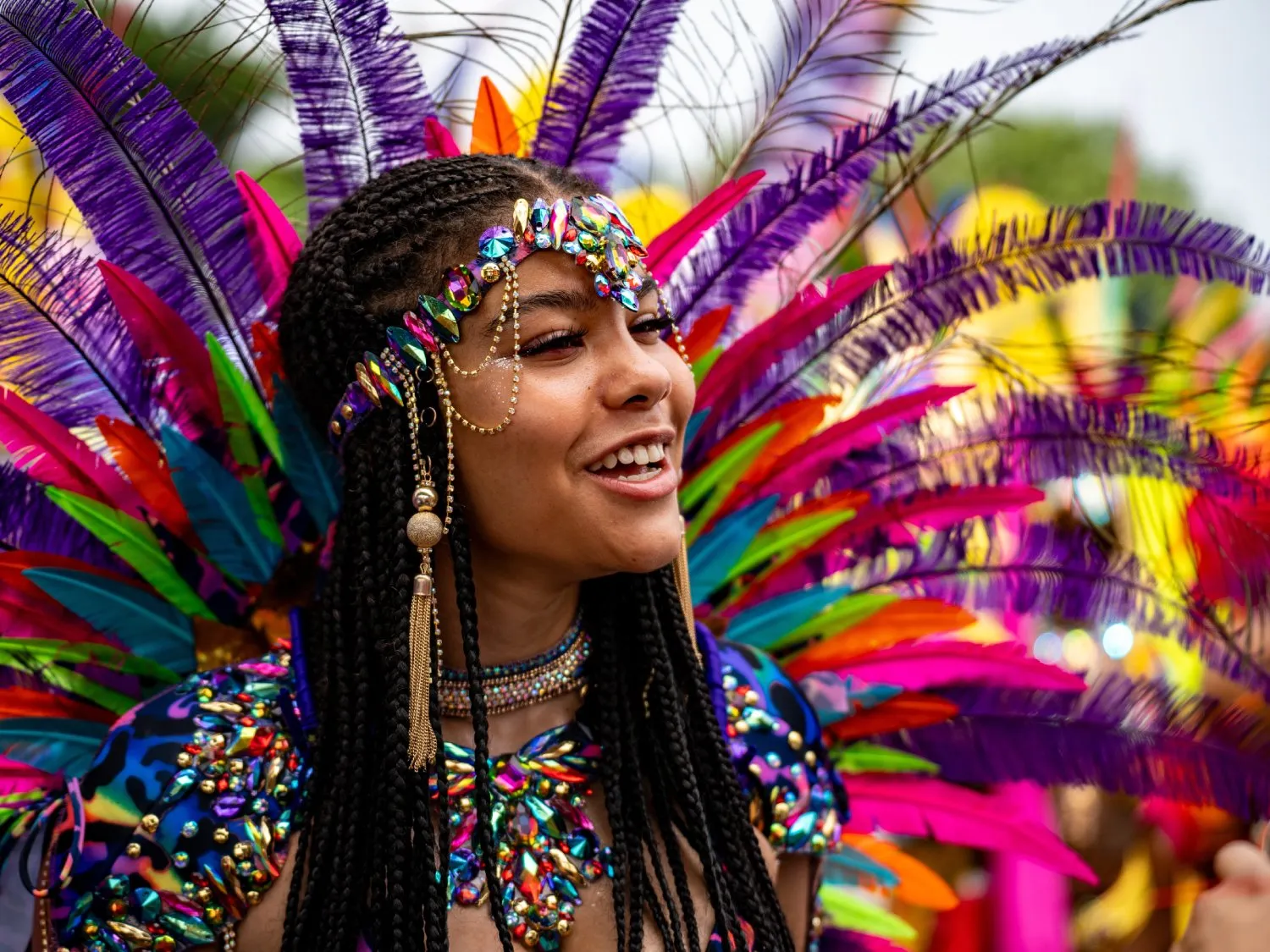 Lady dressed up in a colourful outfit for a festival
