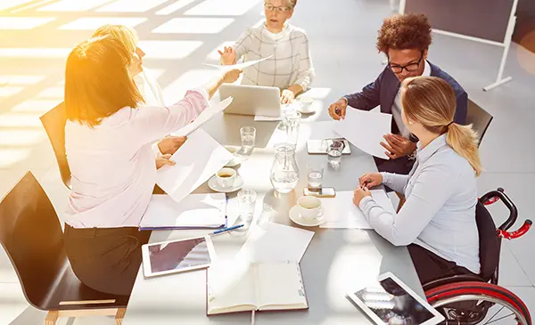 Mixed group of people working together