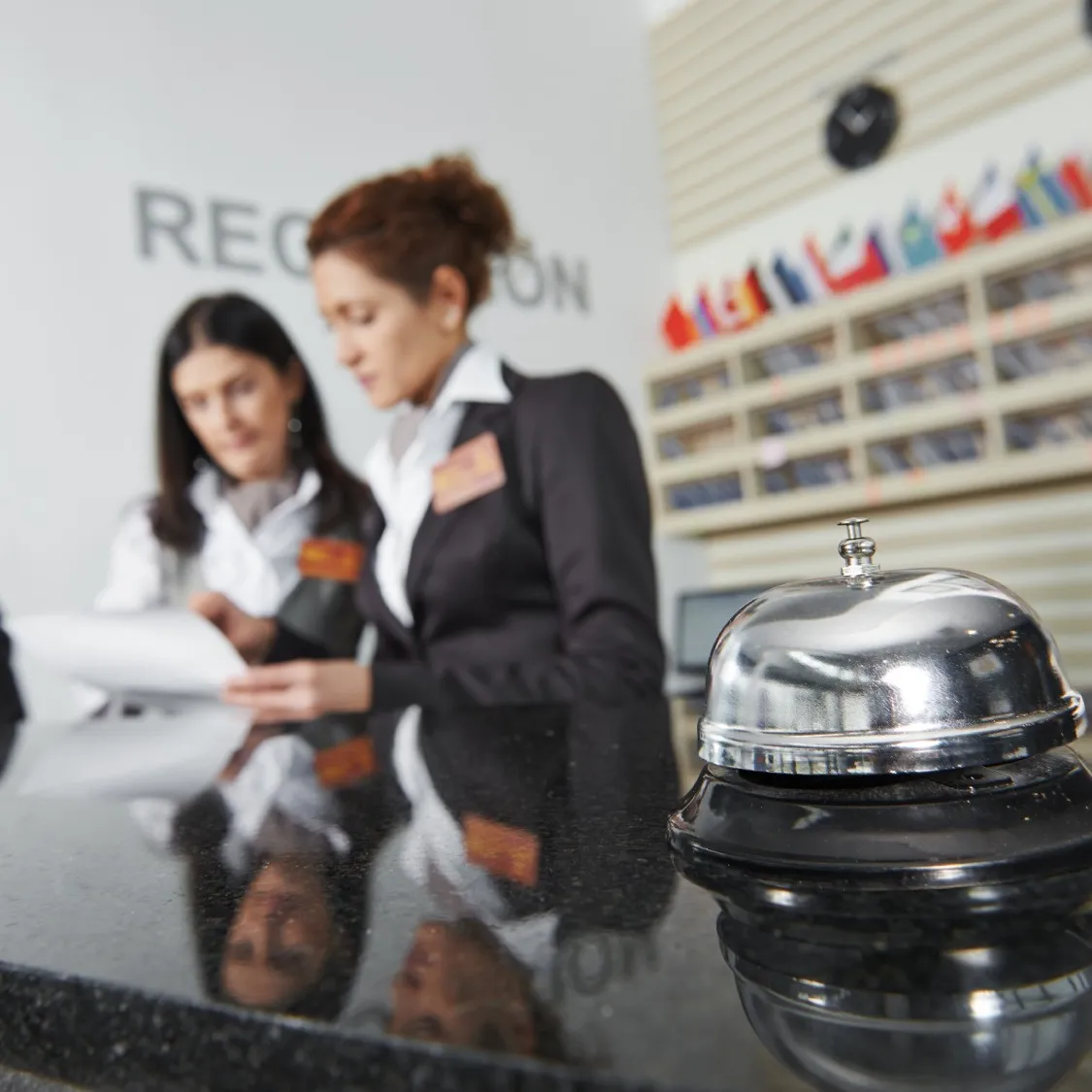 Woman working at a hotel reception